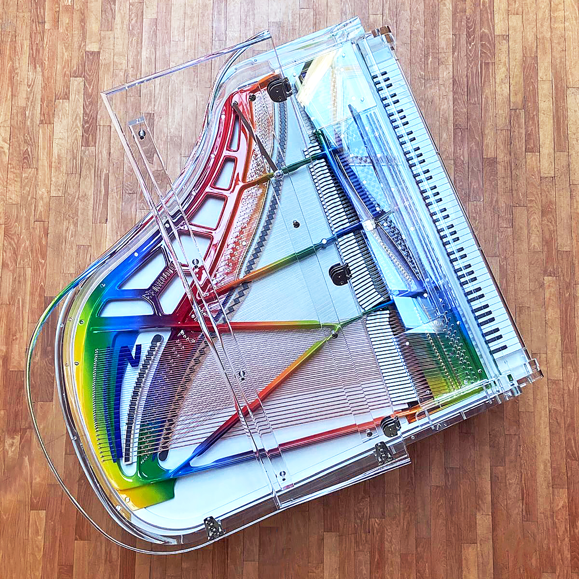 Blüthner iDyllic Grand Piano with rainbow coloured iron frame