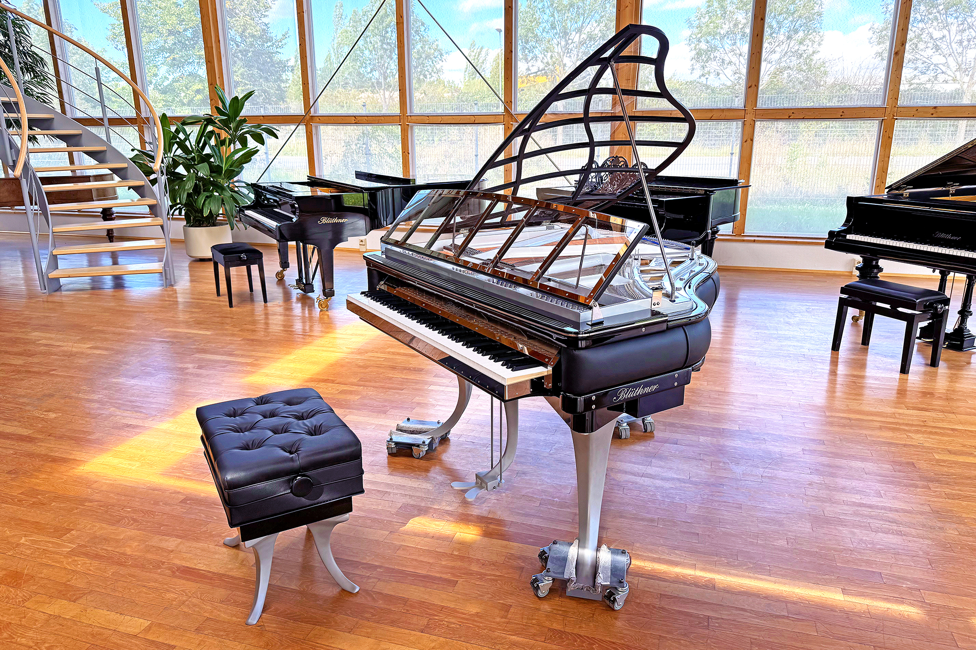 Blüthner PH Grand Piano brushed aluminium legs, black leather and grey iron frame