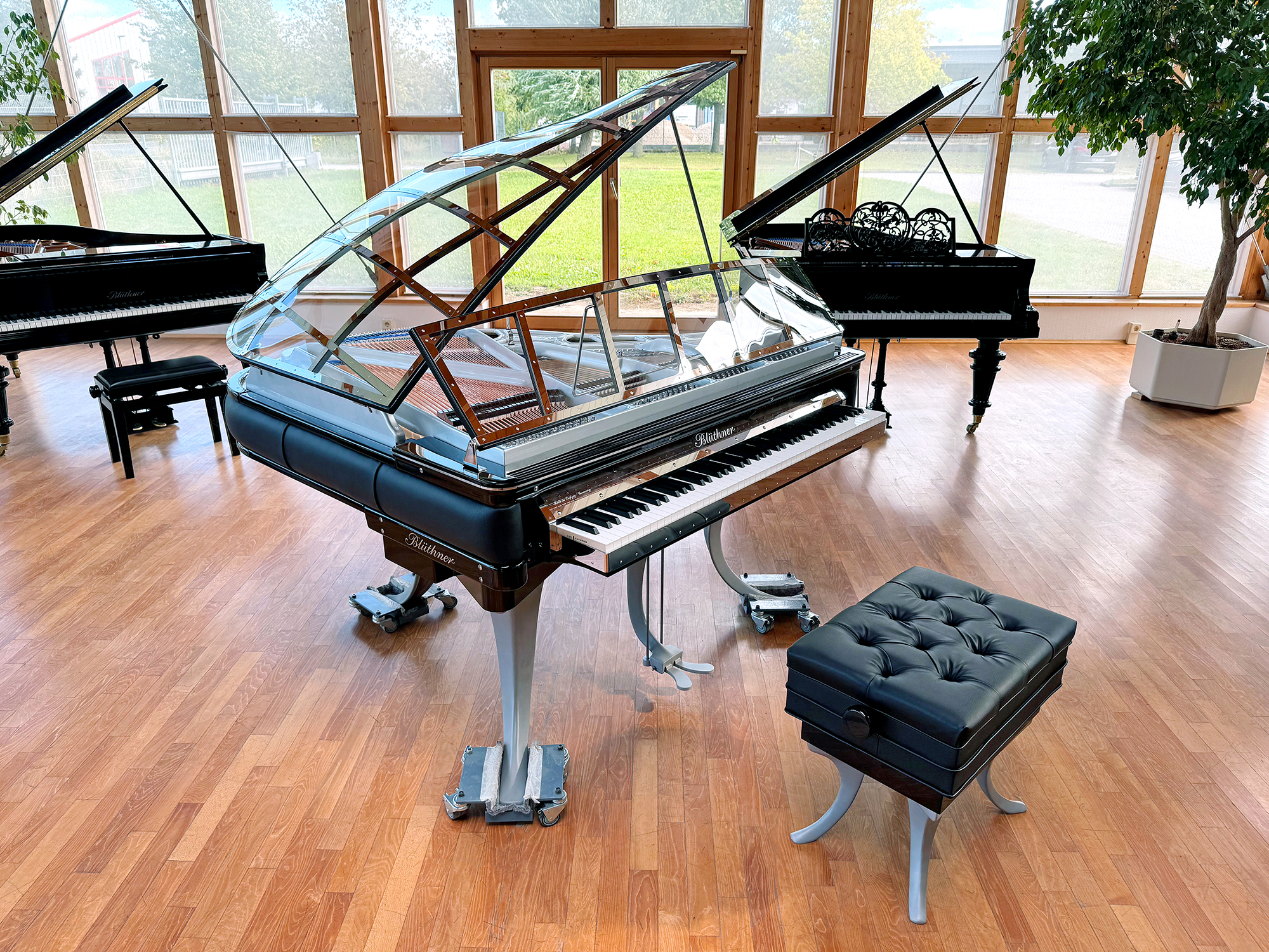 Blüthner PH Grand Piano brushed aluminium legs, black leather and grey iron frame